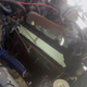 With the air-intake and headers removed (so that something better can be installed).